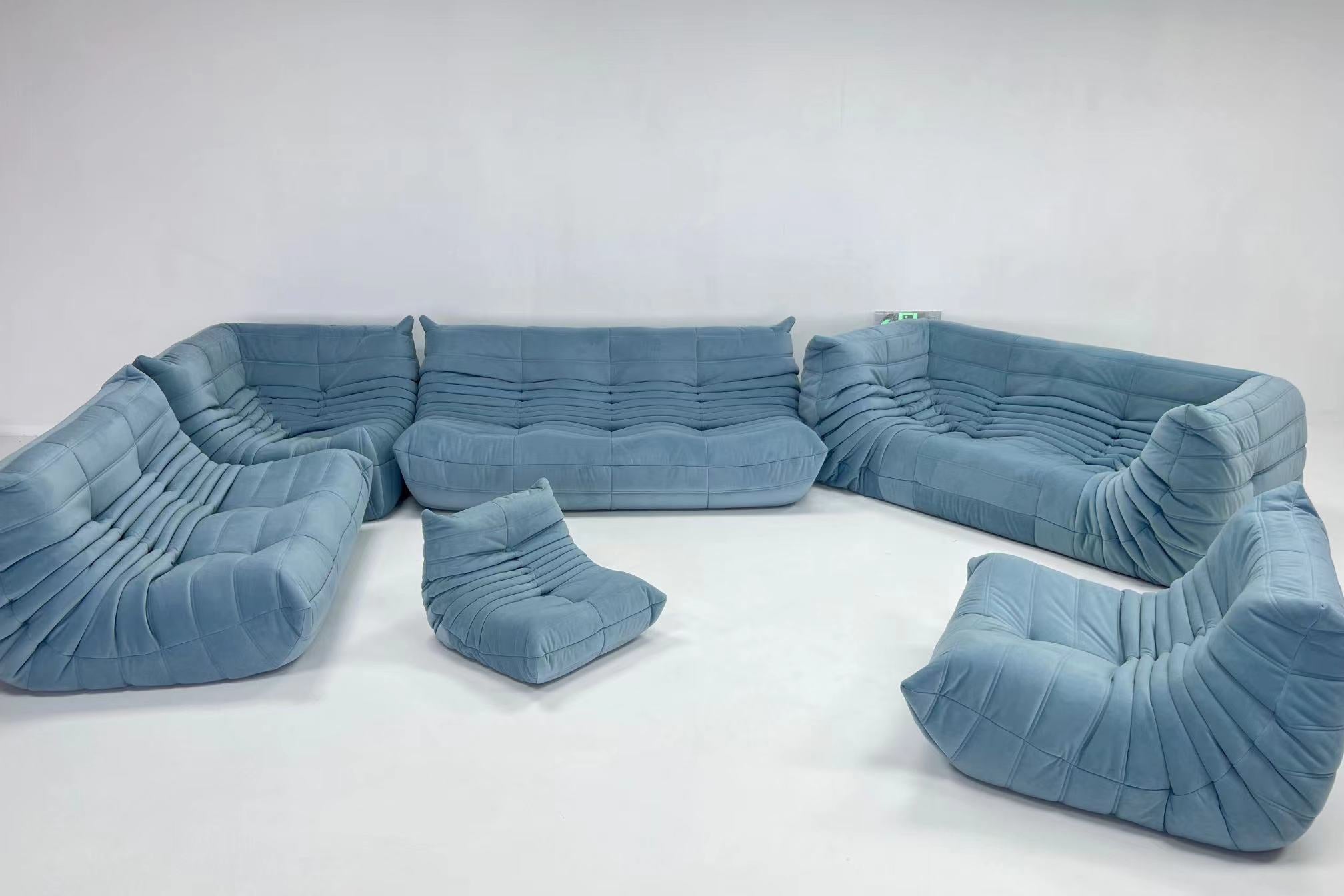 Blue inflatable sofa set on a white background