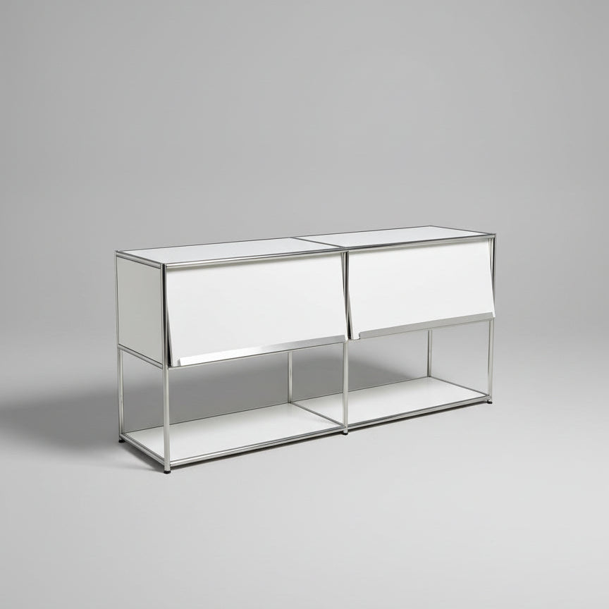 White outdoor furniture set on grass with trees in the background