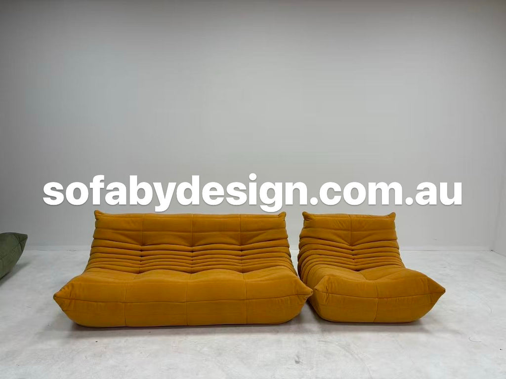 Yellow Togo-inspired sofa collection in a modern living space