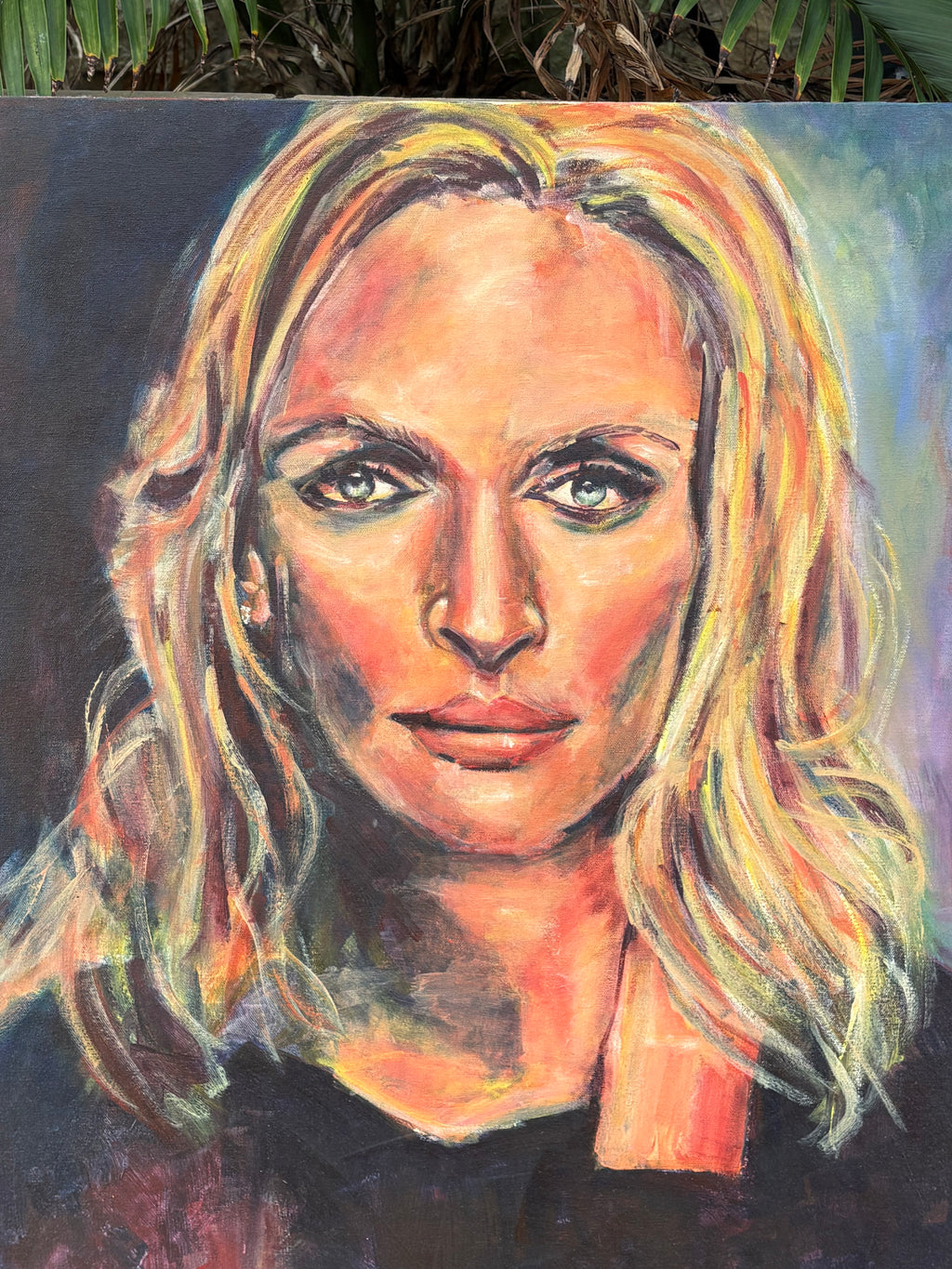 A hand-painted portrait of a strong, blonde-haired woman with expressive eyes, created with bold brushstrokes and vibrant colours, conveying depth and emotion.