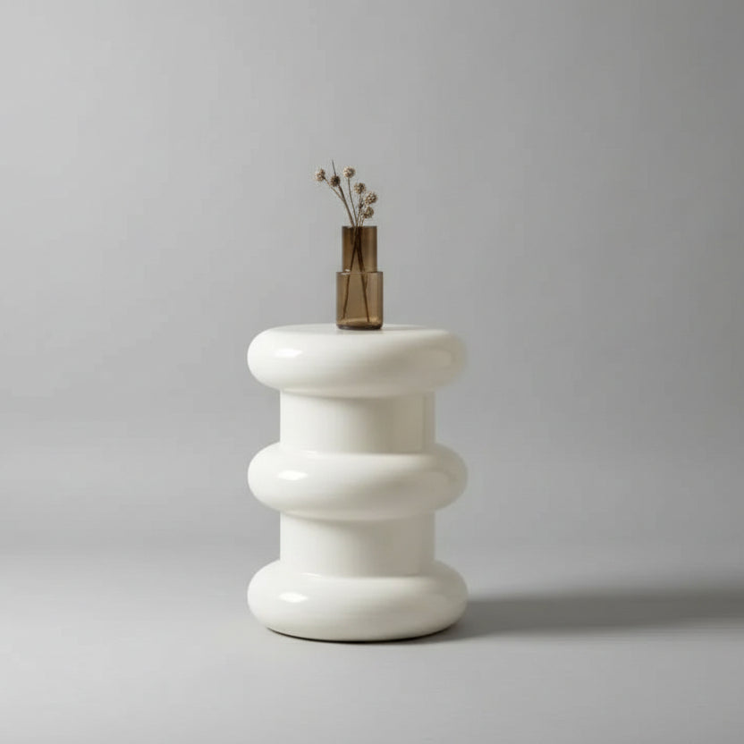 Modern Sculptural Side Table – Unique, Stylish, and Functional
Transform your space with this chic and contemporary side table, perfect for elevating your home décor.

Key Features:
Sleek and Sculptural Design: The side table features a bold, rounded, three-tiered design that adds an artistic flair to any room.
Durable Glossy Finish: Made with a high-quality, glossy finish, this table is not only visually stunning but also easy to clean and maintain.
Versatile Functionality: Ideal for use as a side table, n