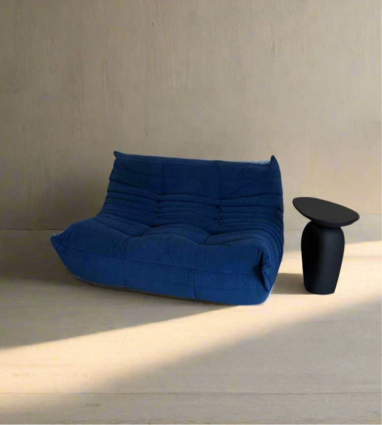 Royal blue vegan suede two seater sofa in a neutral interior