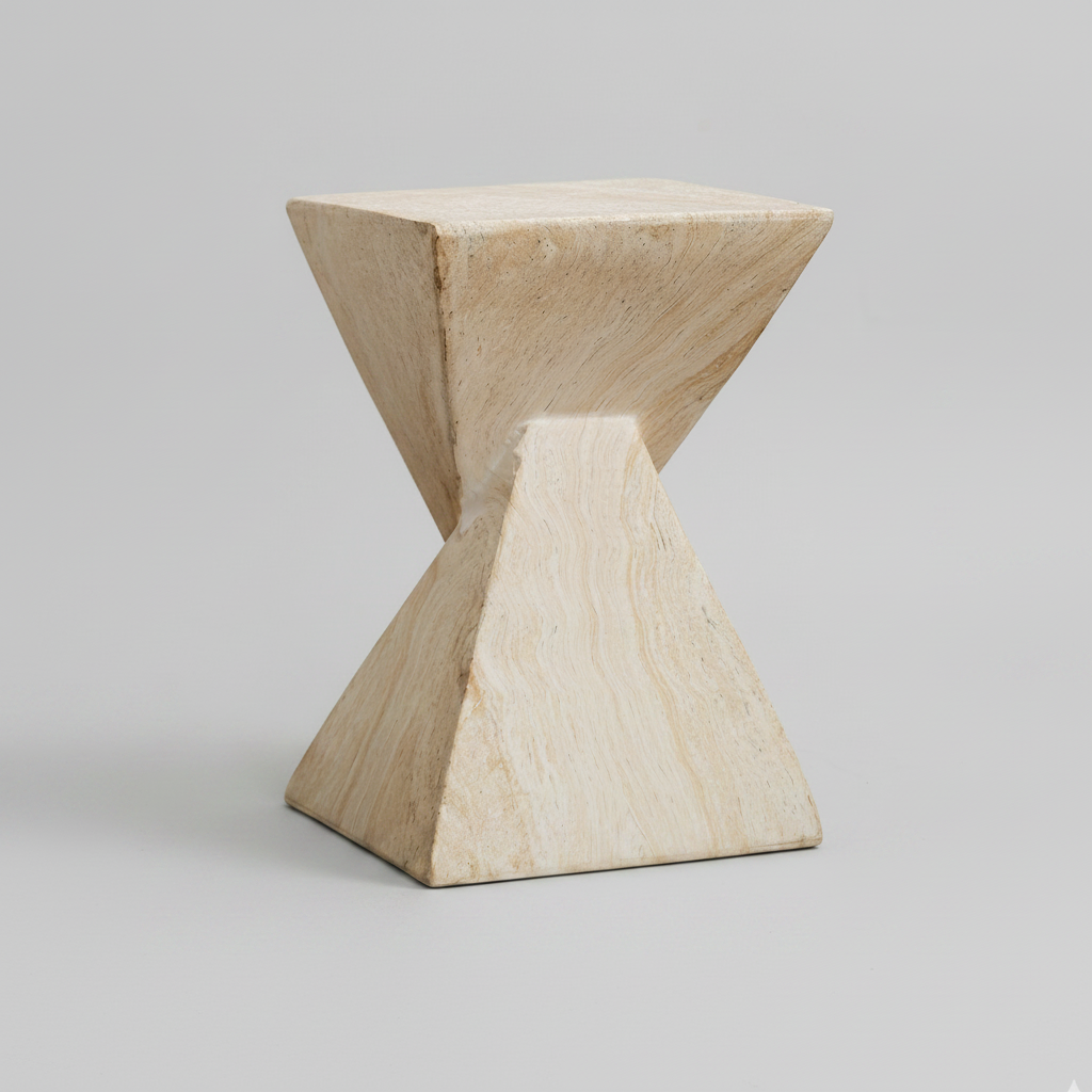 Triangular stone stool on a gray background
